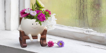 Smiley Face Planter Rocking Chair